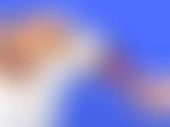 dog being fed a strawberry