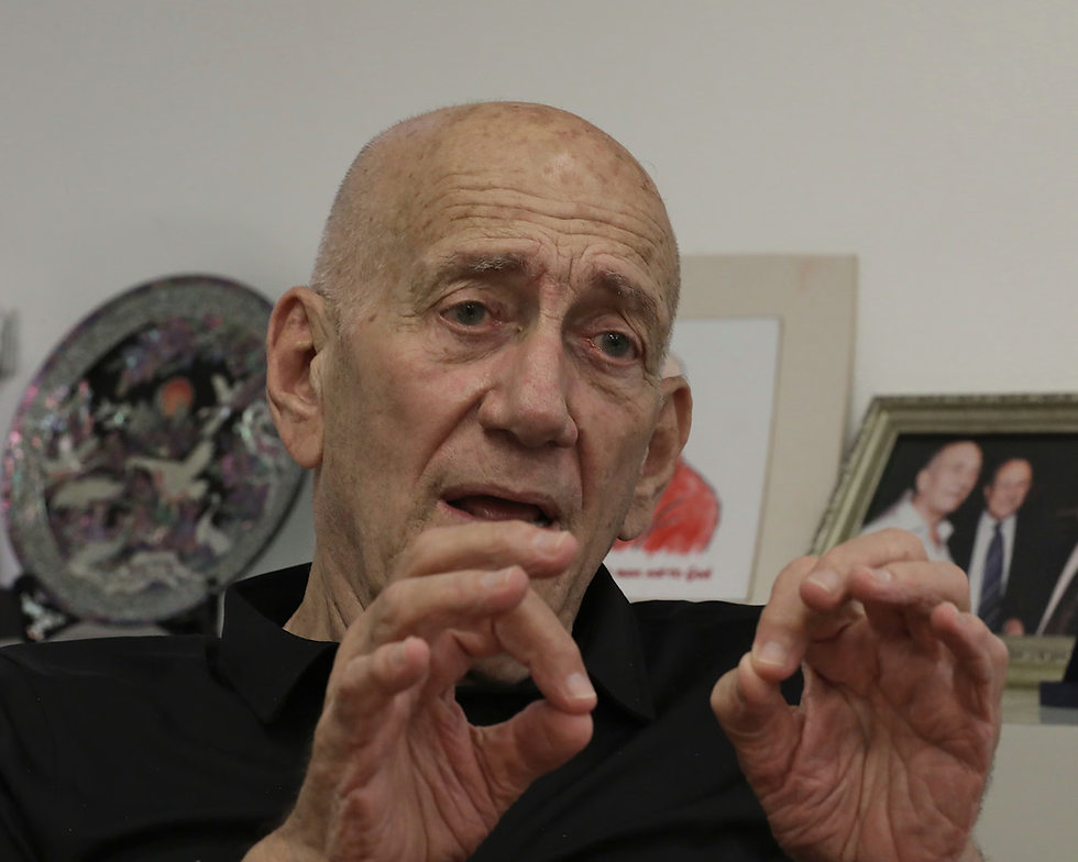 Olmert said Israel was already committing war crimes in Gaza and the West Bank, and constructing the camp would mark an escalation. (Quique Kierszenbaum | The Guardian)