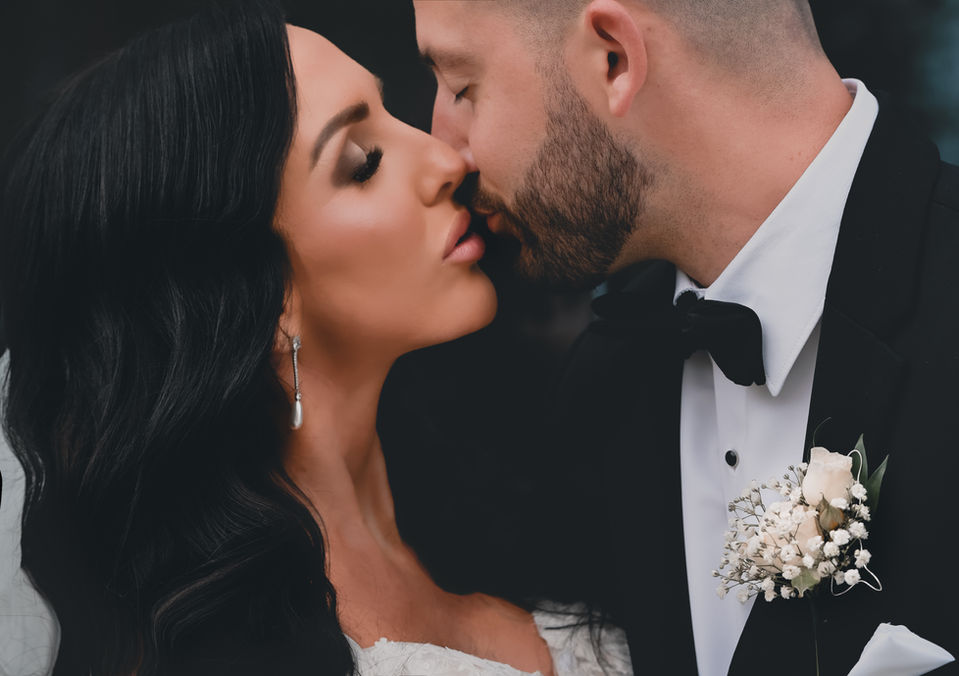 Bride and groom, close-up, kissing at a classic wedding with April G Photography. Classic wedding photography with April G Photography.,destination wedding, dark & moody wedding photographer, moody photographer, April G Photography, dark & Moody wedding photographer, best wedding photographer in cleveland, best wedding photographer in ohio, editorial wedding photographer,  romantic wedding photographer, unique wedding photographer,  medina weddings, akron weddings,  cleveland weddings, experienced wedding photographer, destination wedding photographer,  elopement wedding photographer