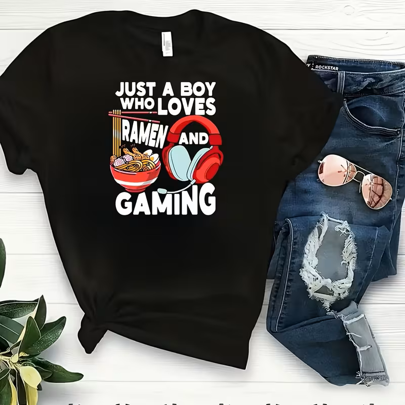 Black T-shirt featuring the phrase “Just a Boy Who Loves Ramen and Gaming,” with illustrations of a ramen bowl, chopsticks, a