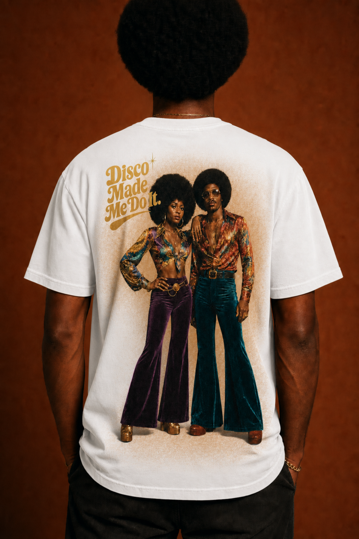 White T-shirt featuring a retro 1970s disco couple with colorful outfits and afro hairstyles, accompanied by gold text readin