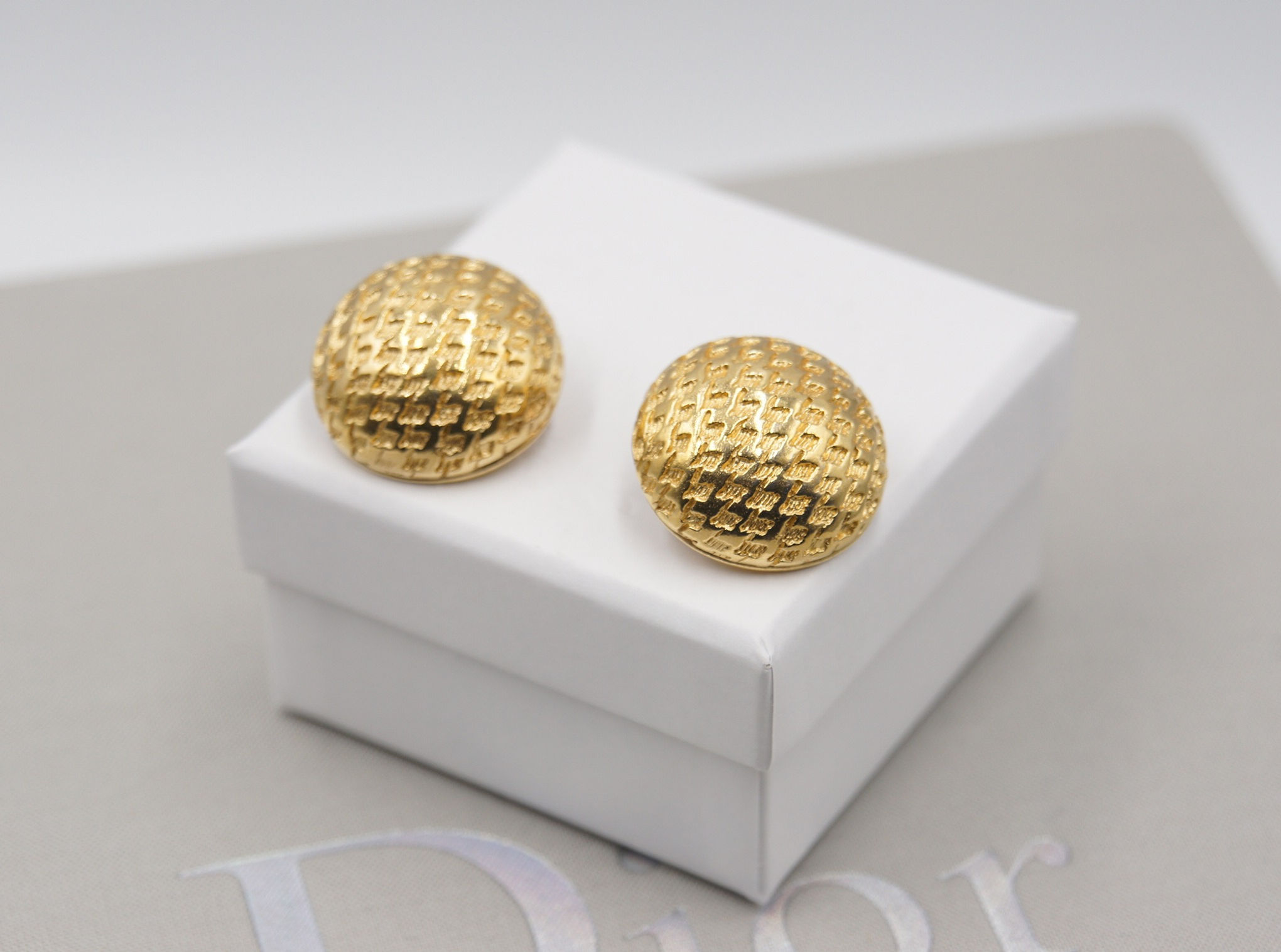 Dior button earrings