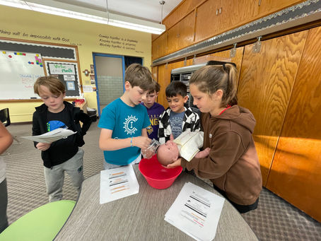 3rd Graders Learning about Baptism
