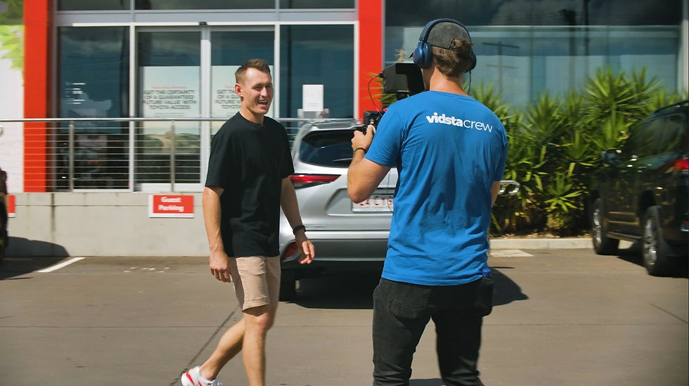 Eye-level view of a vibrant outdoor event decorated with fairy lights