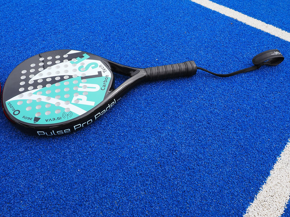 Thumbnail: Pulse finesse padel racket in black, green and blue with a gloss finish. Made from carbon fibre. Beginner padel racket