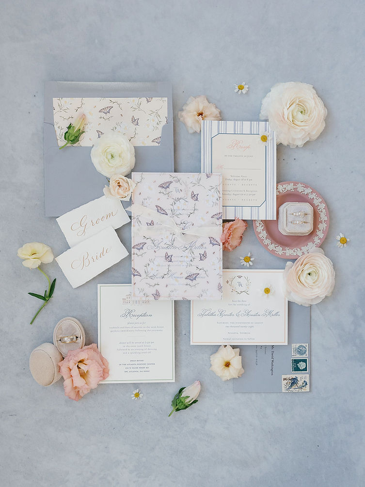 wedding details like invitation, rings, and florals for a broadmore wedding
