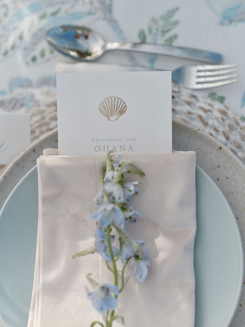 plate settings with coastal vibe at maui destination wedding reception