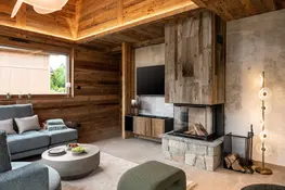 Salon et cheminée dans notre chalet à louer au coeur des vosges
