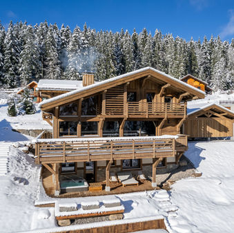 vue drône en hiver du forest lodge, chalet à louer dans les vosges