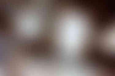 Bhargav's 24th birthday, him cutting his cake while people in the back cheer