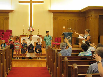 Blessing of the Backpacks during worship
