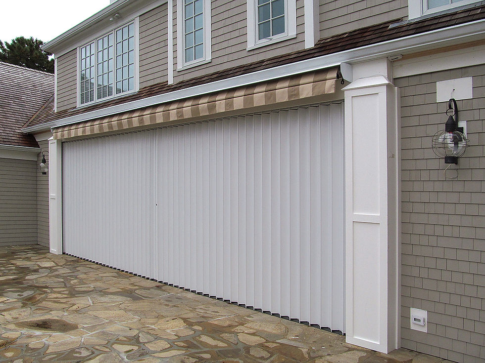 Accordion Shutter Sliders Over Garage Door