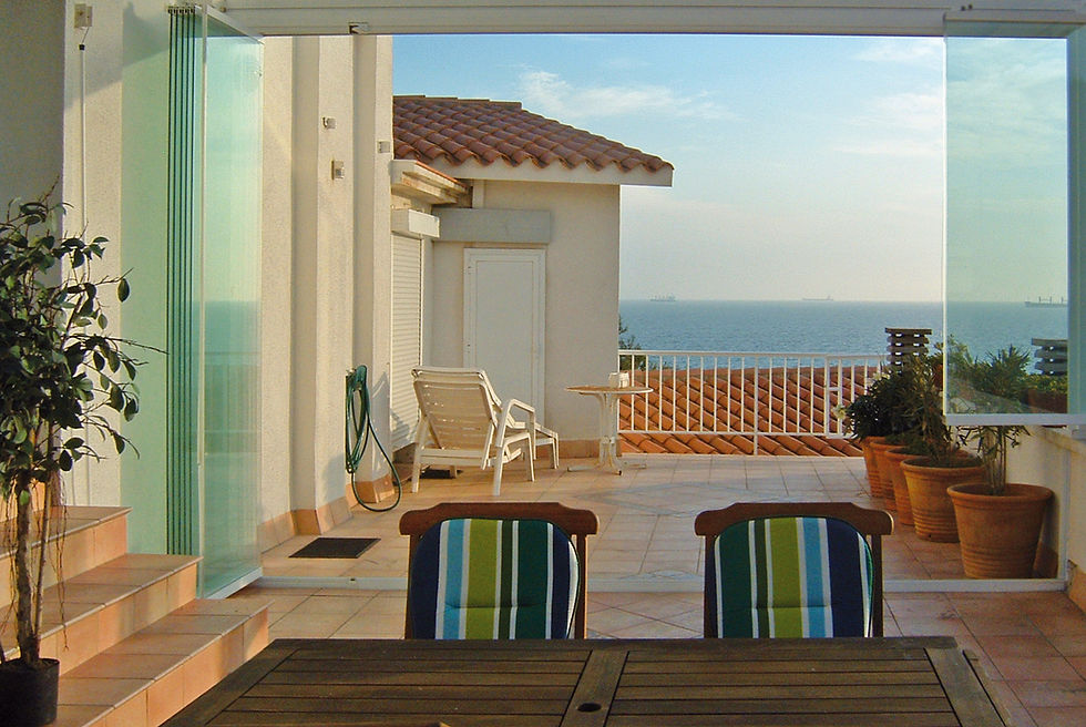 Folding Glass Walls Opened Up To A Patio Area | Big Sky Room
