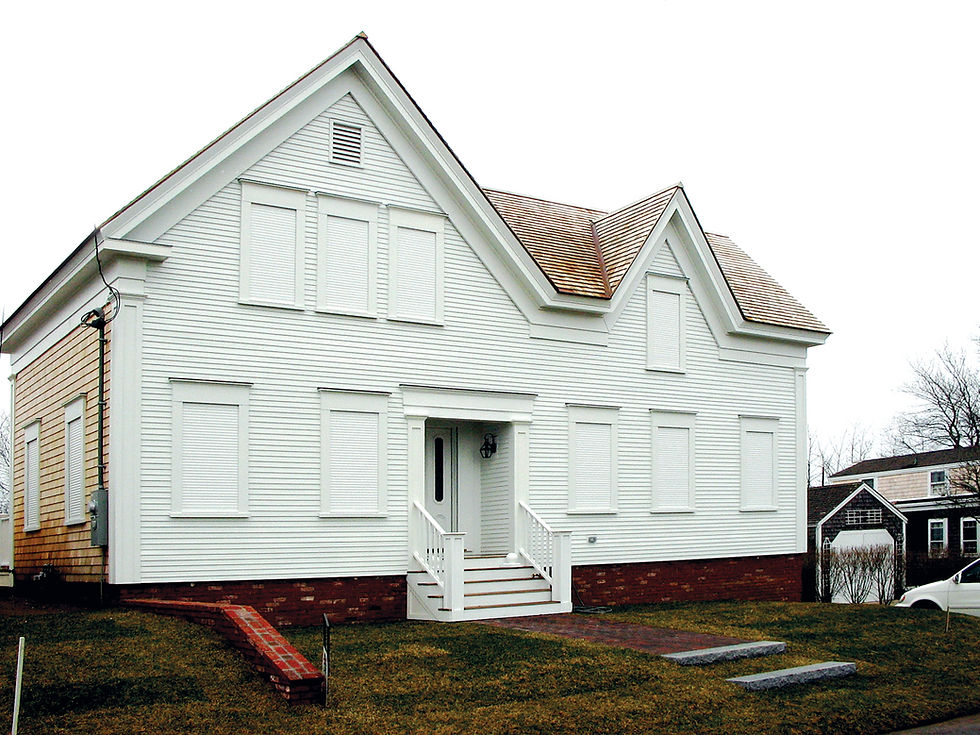 White RollShutters Installed On A Home