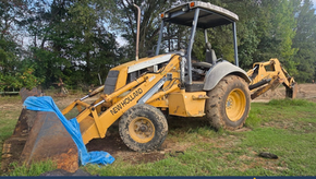 NEW HOLLAND 555E BACKHOE