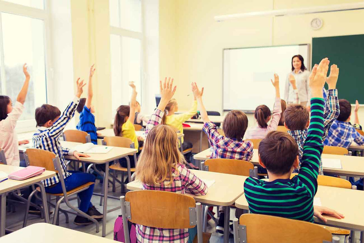 Classroom-with-hands-up-feature.jpg