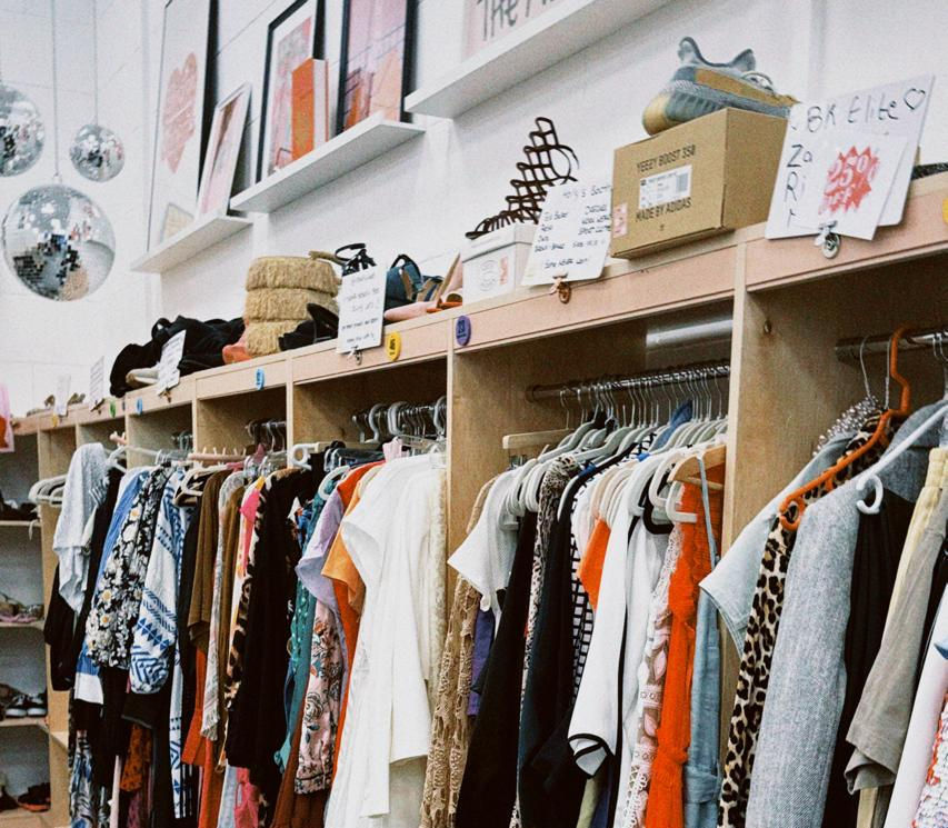 Eye-level view of clothing stand with a vintage colorful jacket