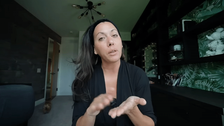 Woman applying skincare