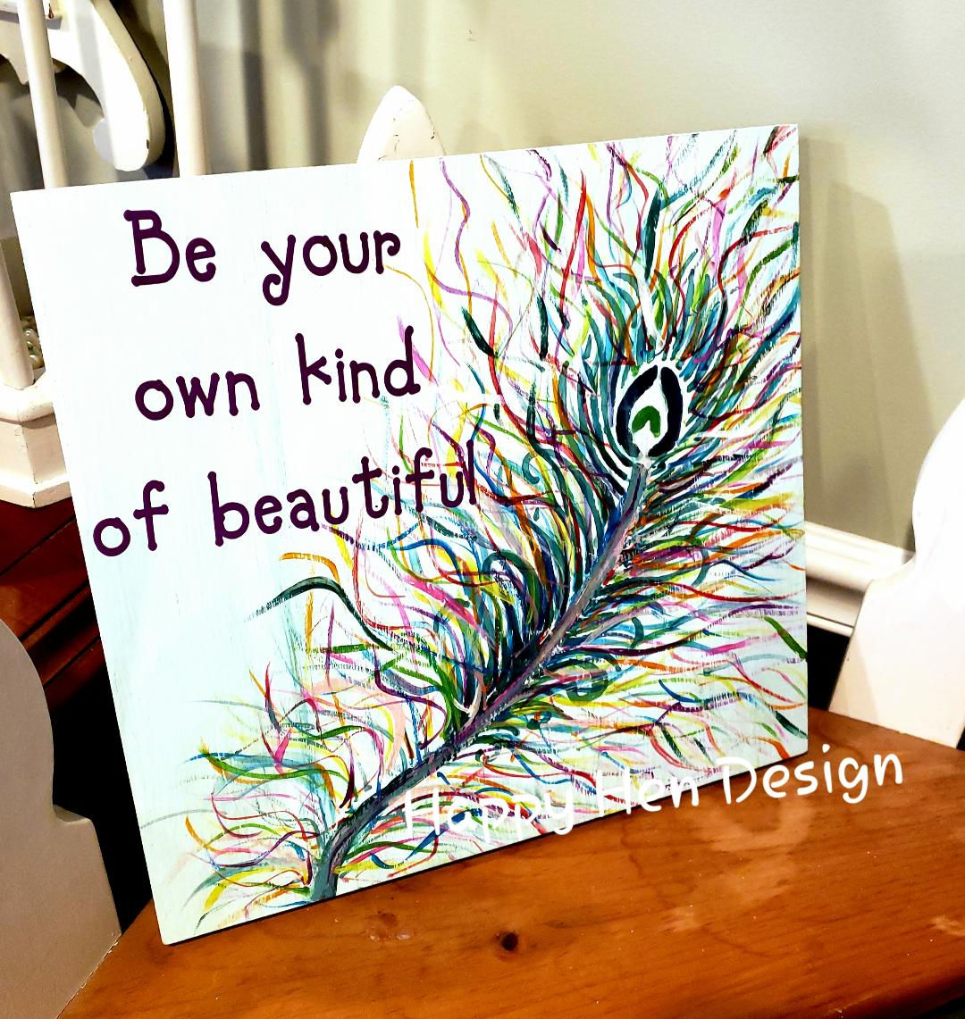 12x12 Wood Peacock feather painting with a positive saying.