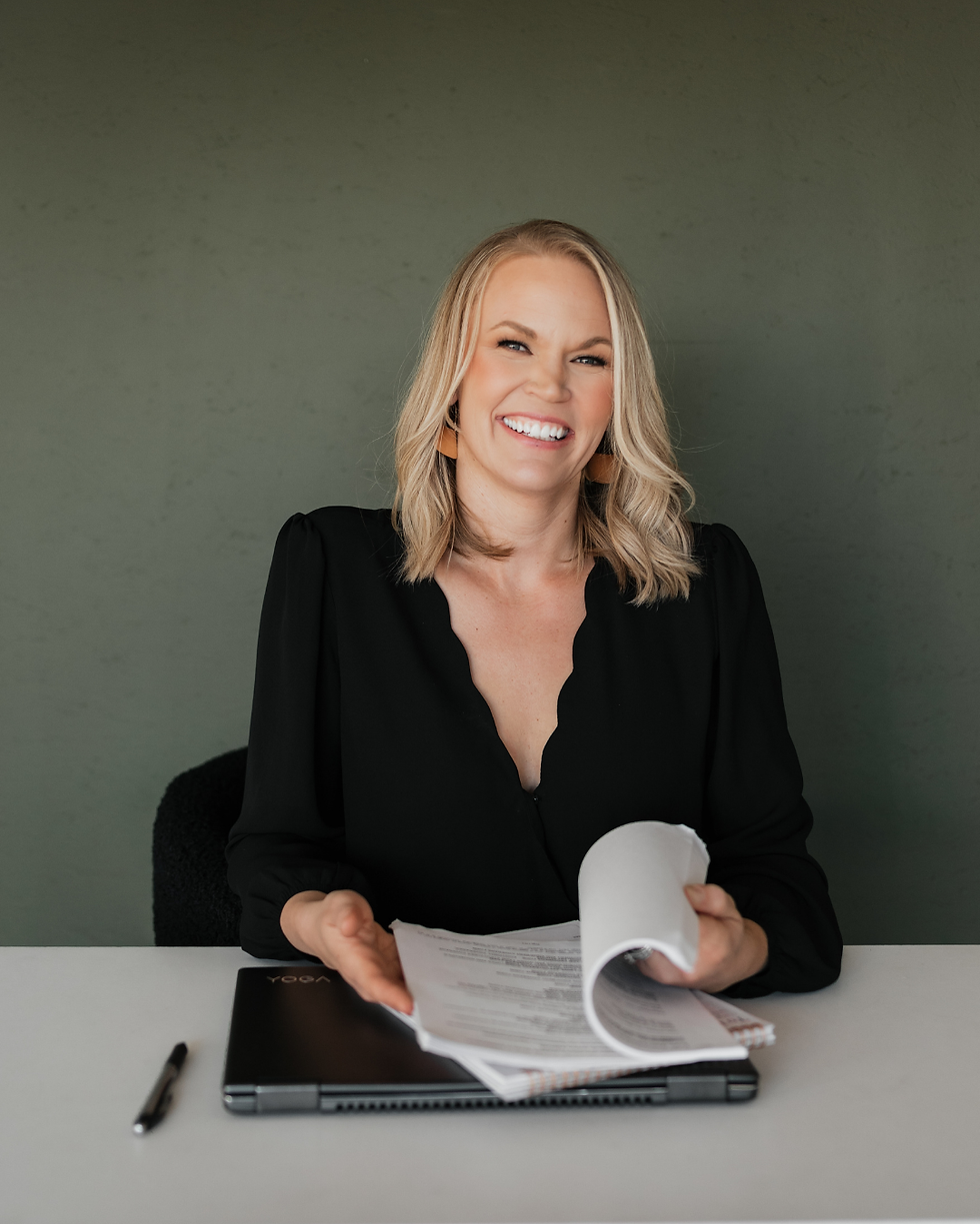 Hailie Hillock reviewing a policy