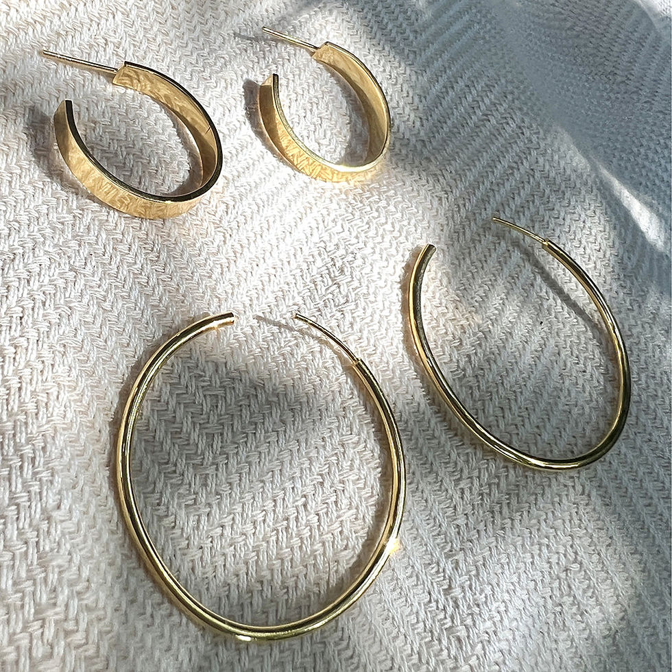 Thumbnail: Chunky Rounded Huggie Hoop Earrings