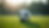 Eye-level view of a soccer ball on a green field ready for training