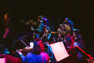 Conor Houston on stage with the Beatles Project orchestra