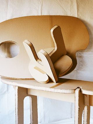 Cardboard prototype of Faye Toogood’s Palette Side Table.