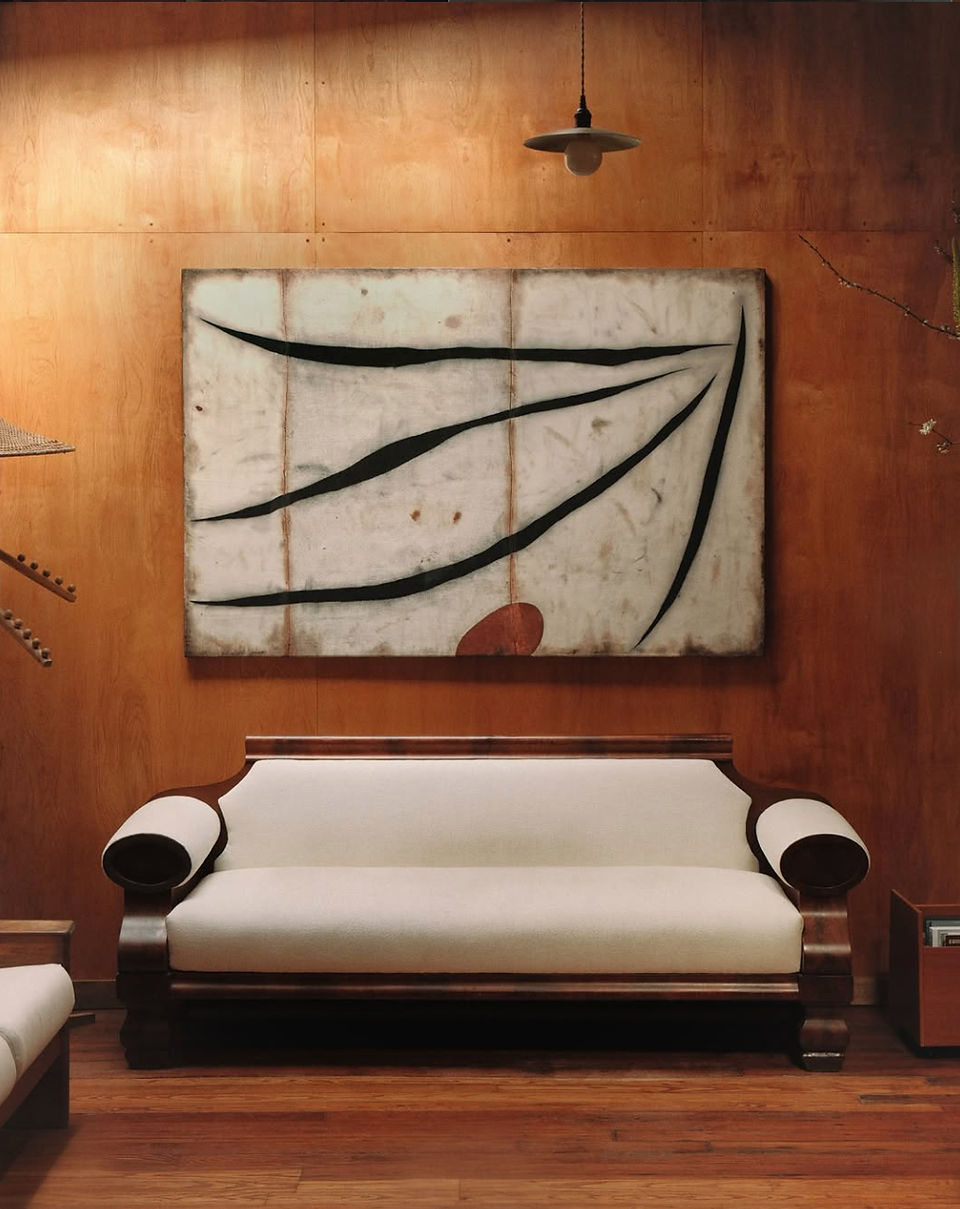 Tage Gallery interior wood sofa wall artwork