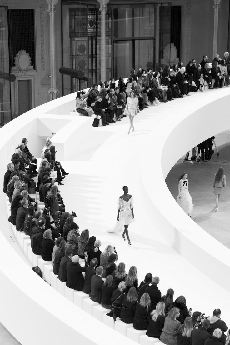Chanel Haute Couture Spring/Summer 2025 fashion show, presented on a white double-C runway inside the Grand Palais.
