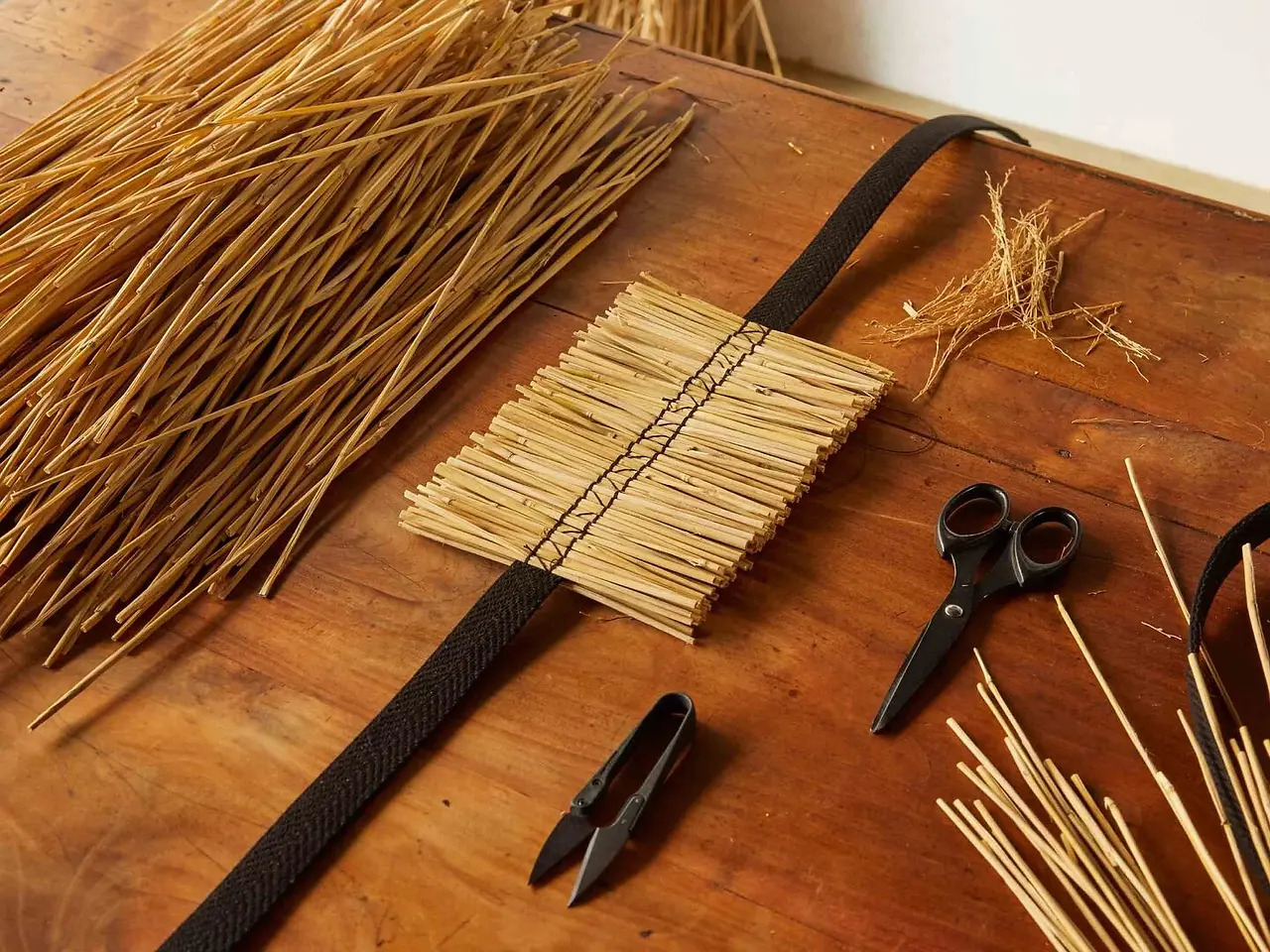 Straw weaving tools and materials for Loewe Craftsmanship.
