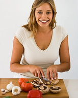 Woman Cutting Vegetables