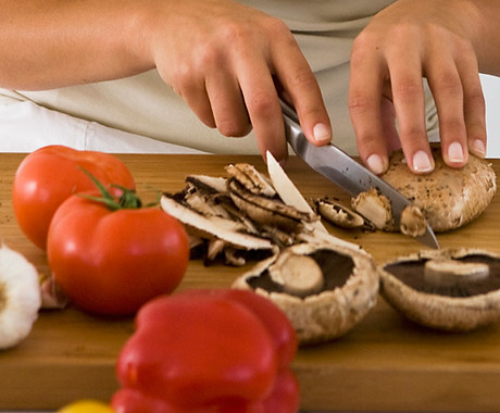 Woman Cutting Vegetables