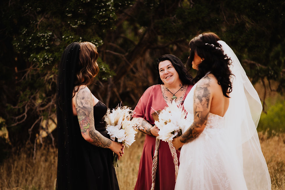 Couple with officiant during elopement ceremony in zion