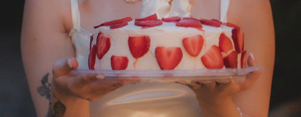 strawberry wedding cake with calico critter cake topper