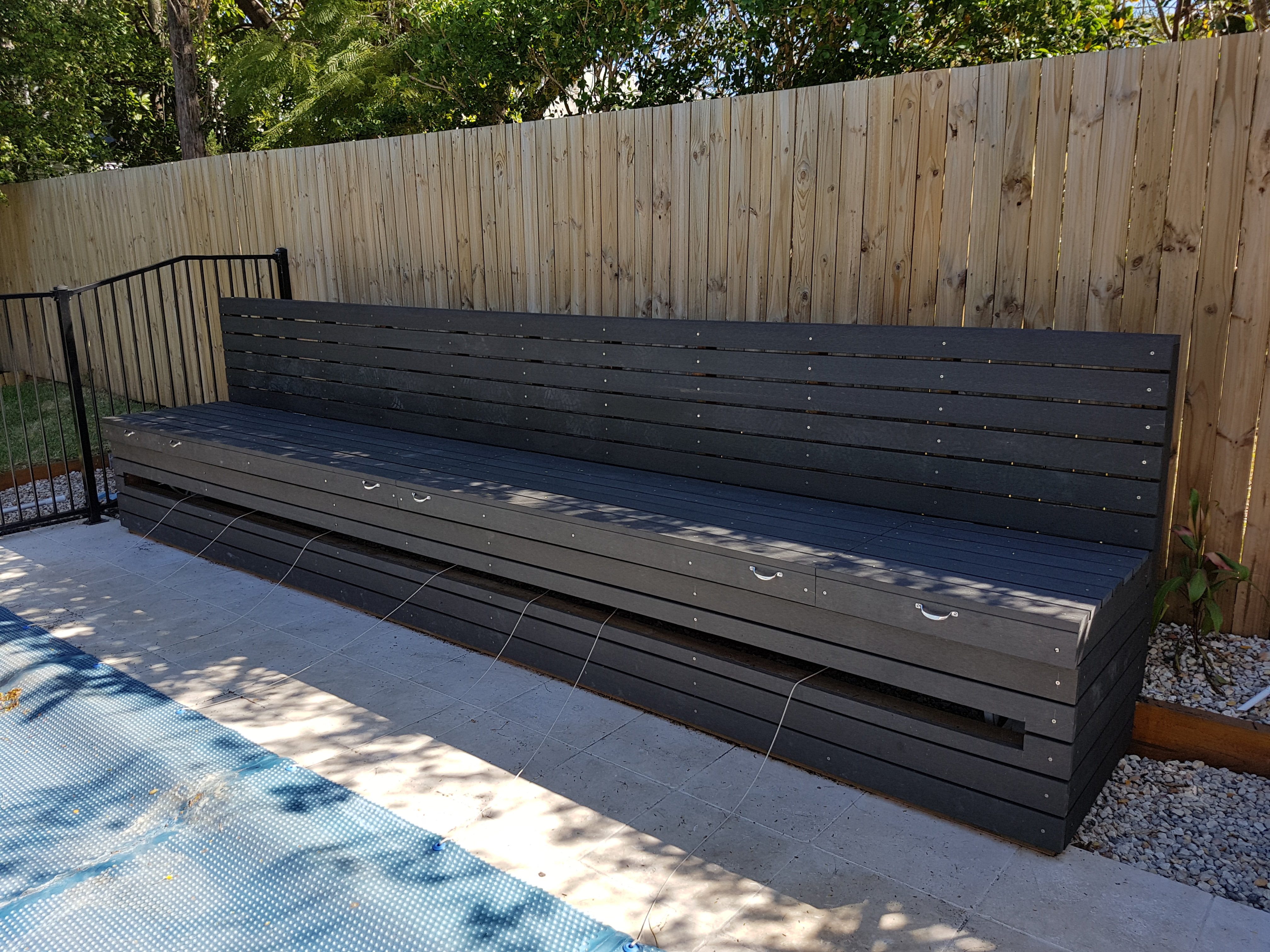 Completed Brisbane carpentry project: Pool Cover Storage and Seat