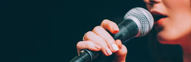 depositphotos_263072772-stock-photo-singer-microphone-vocal-talent-music_edited.jpg