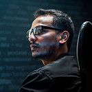 man-analysing-binary-code-virtual-screen.jpg