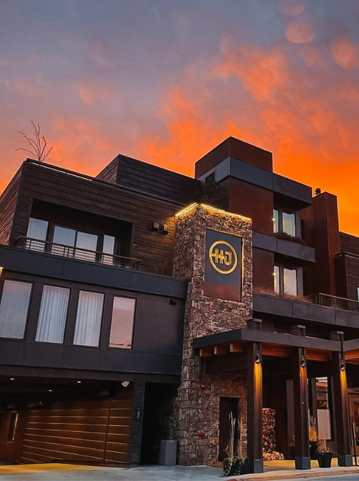 Exterior of Hotel Jackson in Downtown Jackson, Wyoming with Modern Western Architecture at Dusk