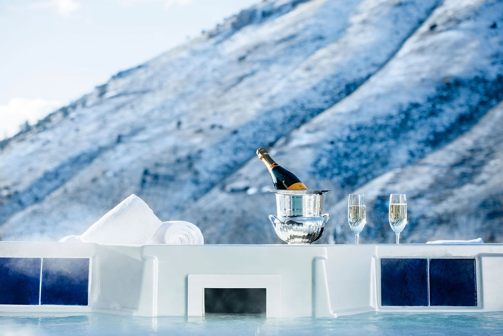 outdoor hot tub with mountain view