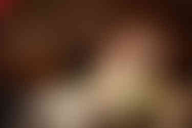 couple gets married over a small candlelit table