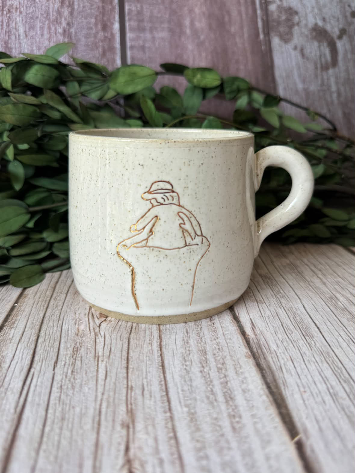 White glazed mug with personalised drawing of child on man's shoulders