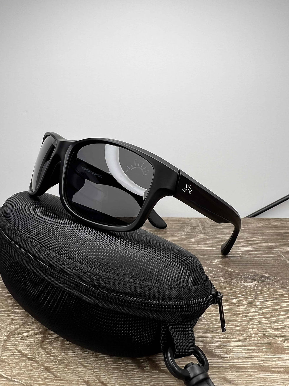 Thumbnail: Side view black lens and black frame floating sunglasses with the included zipped case in the background.