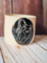 Personalised family mug of woman and her dog showing the natural speckled clay and black glaze design