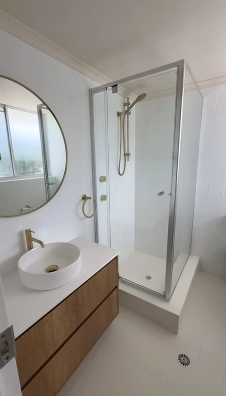 Resurfaced wall tiles in shower of Sydney renovation
