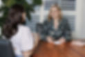 Helen Whait, founder of ActivOT, listening to another woman