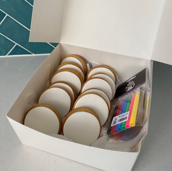 PYO cookie pack including a box of white fondant biscuits, markers and bags