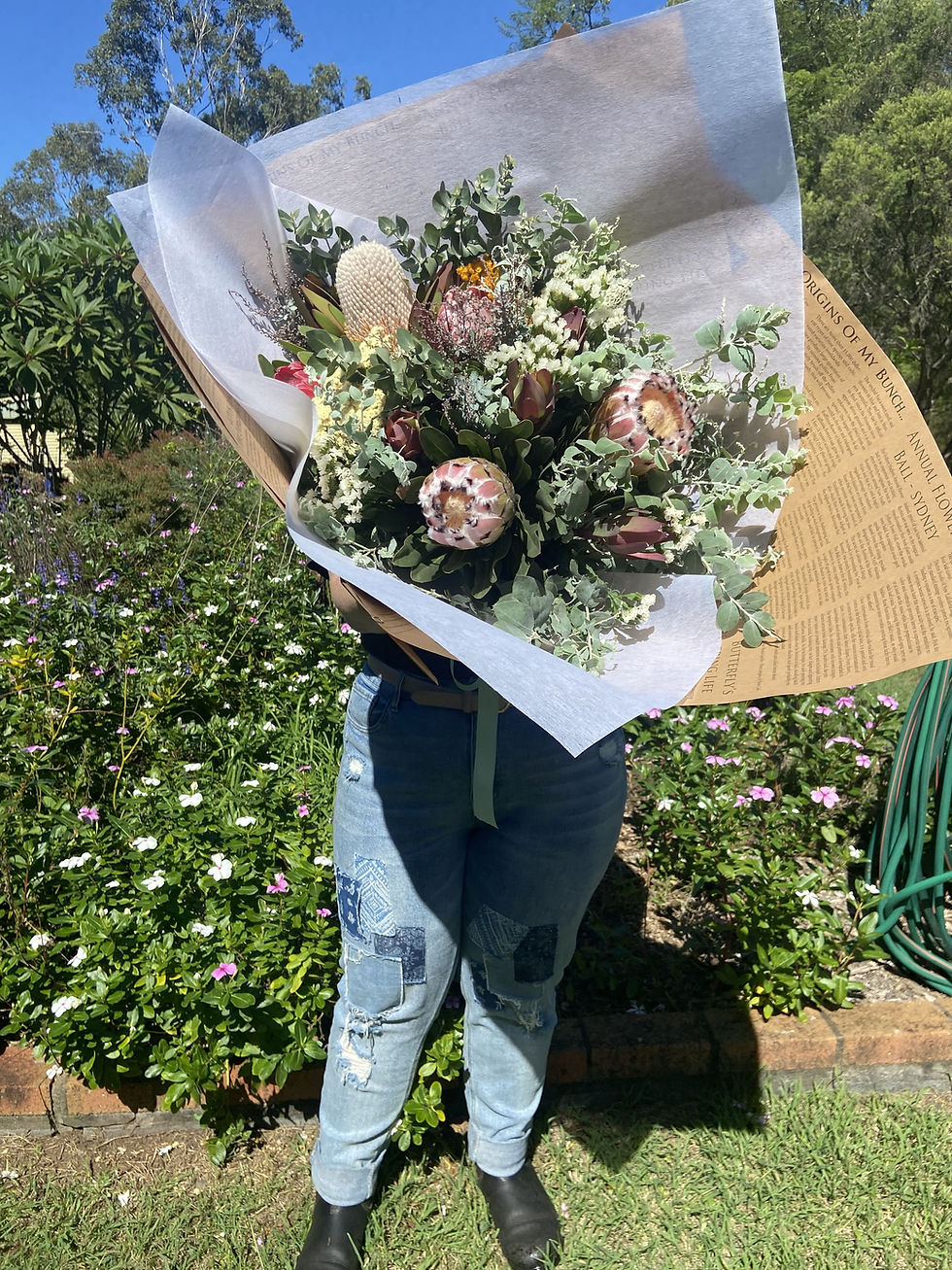 Thumbnail: Native bouquet being held by Toowoomba local florist