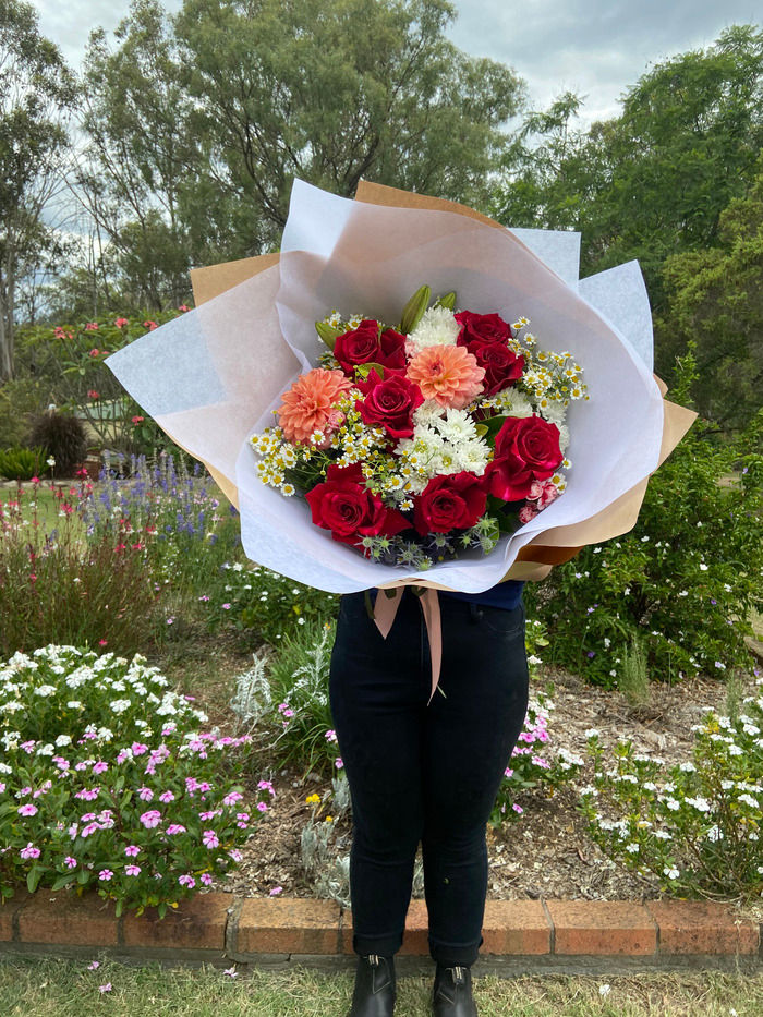 Red and white Christmas flowers for delivery in Toowoomba