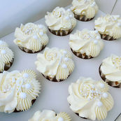 White gluten free cupcakes in a box